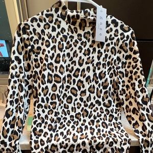 Long sleeve turtle neck cheetah print shirt